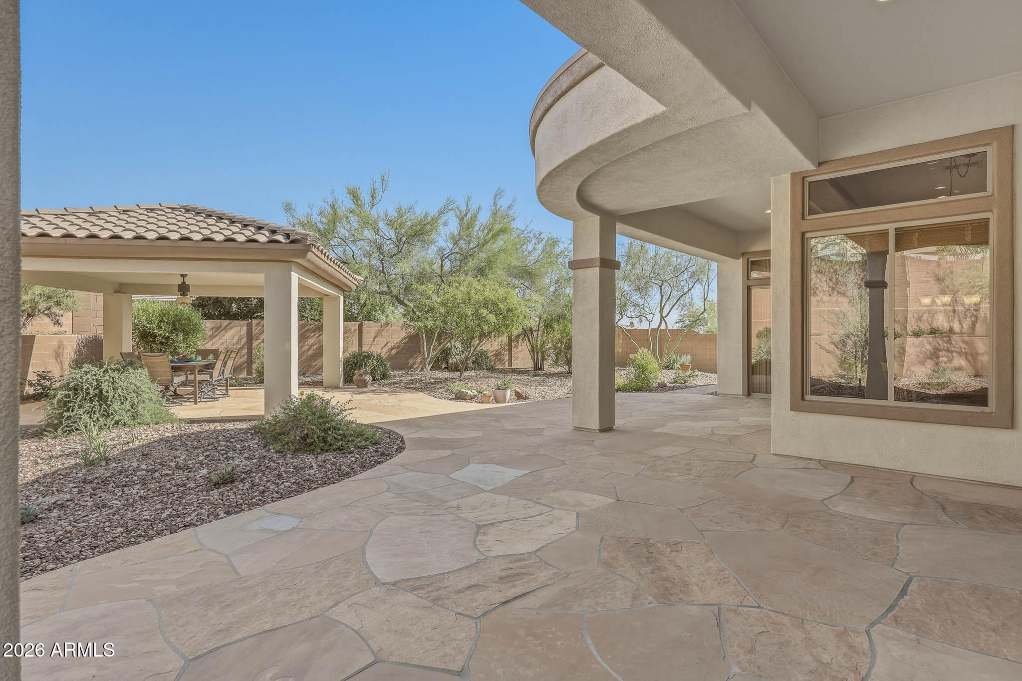 2129 West Legends Way Anthem, AZ 85086 - Photo 43 of 57 a view of a house with backyard and porch