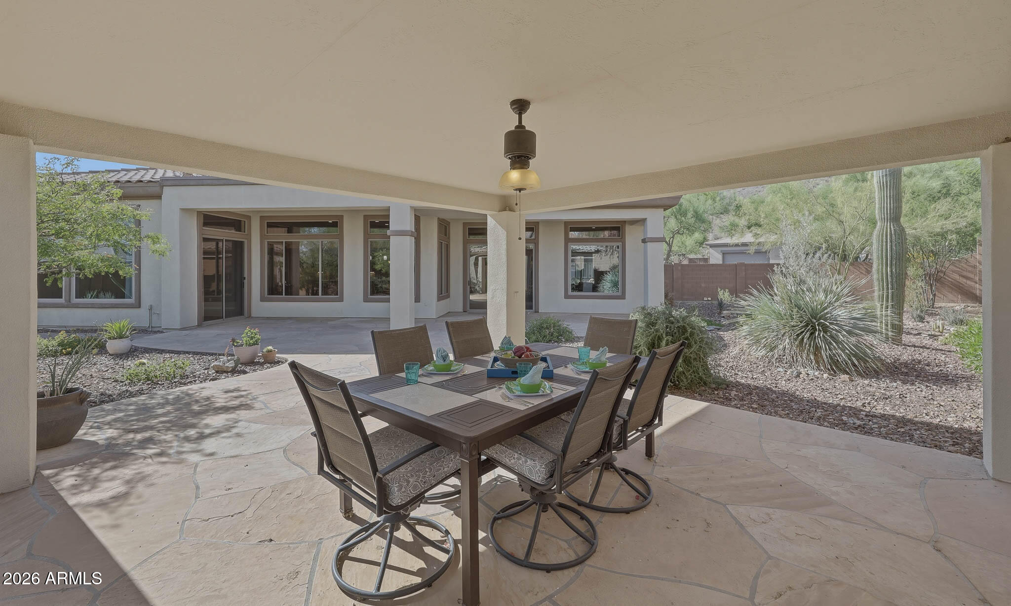 2129 West Legends Way Anthem, AZ 85086 - Photo 46 of 57 a view of a dining room with furniture window and outside view
