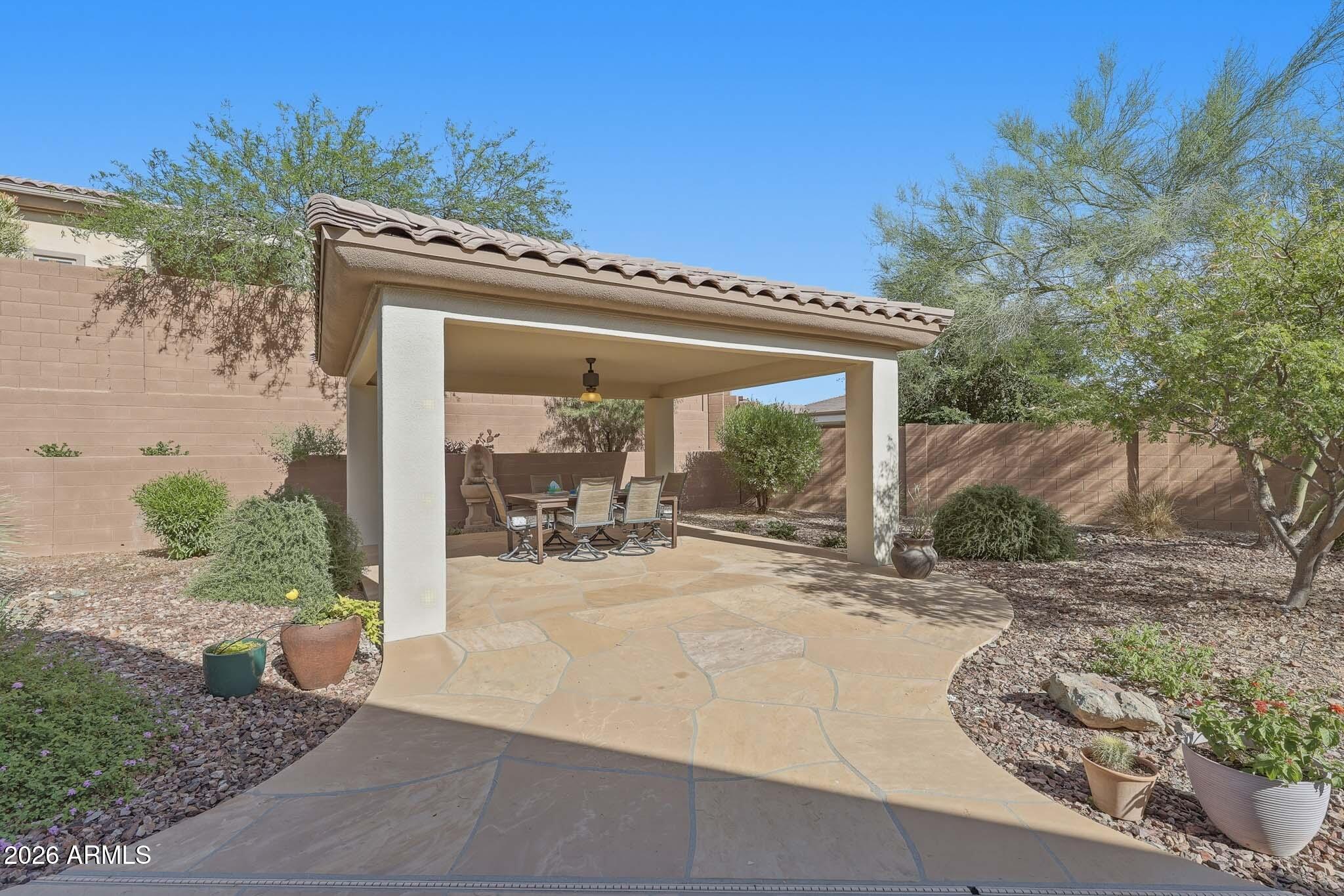 2129 West Legends Way Anthem, AZ 85086 - Photo 57 of 57 a view of a house with porch and furniture