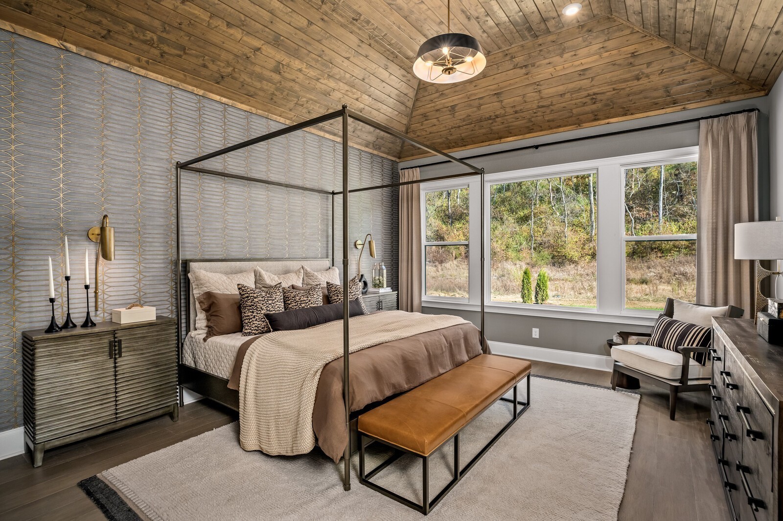 3206 Hunziker Lane Fairview, TN 37062 - Photo 25 of 75 a bedroom with a bed a chandelier and a large window