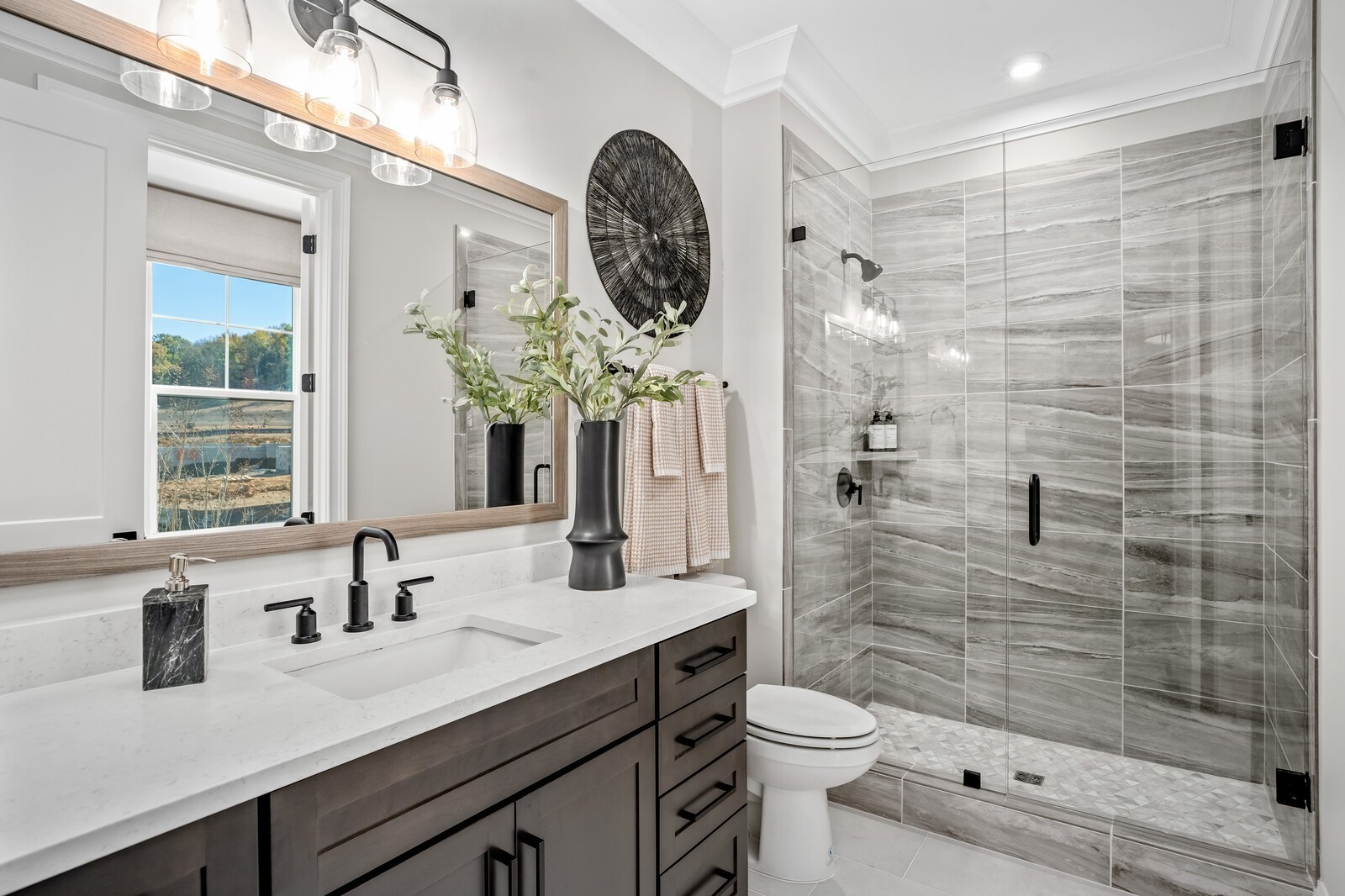 3206 Hunziker Lane Fairview, TN 37062 - Photo 36 of 75 a bathroom with a sink a toilet and shower
