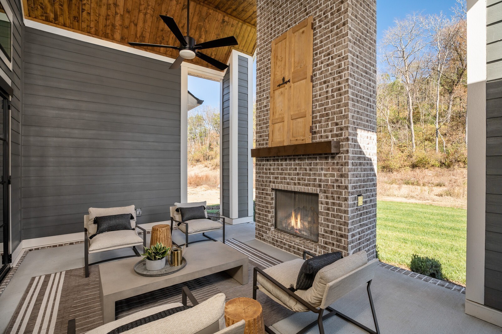 3206 Hunziker Lane Fairview, TN 37062 - Photo 51 of 75 a view of a patio with couple of chairs and a fire pit