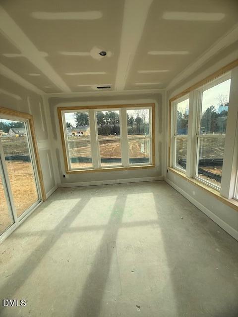 30 Slippery Elm Road Youngsville, NC 27596 - Photo 11 of 23 a view of an empty room with a fireplace and a large window