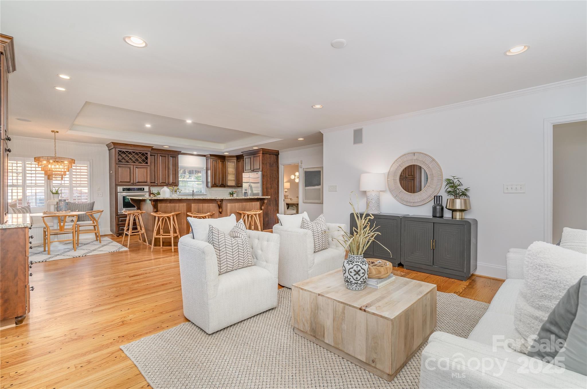 5411 Doncaster Drive Charlotte, NC 28211 - Photo 16 of 40 a living room with furniture and a wooden floor