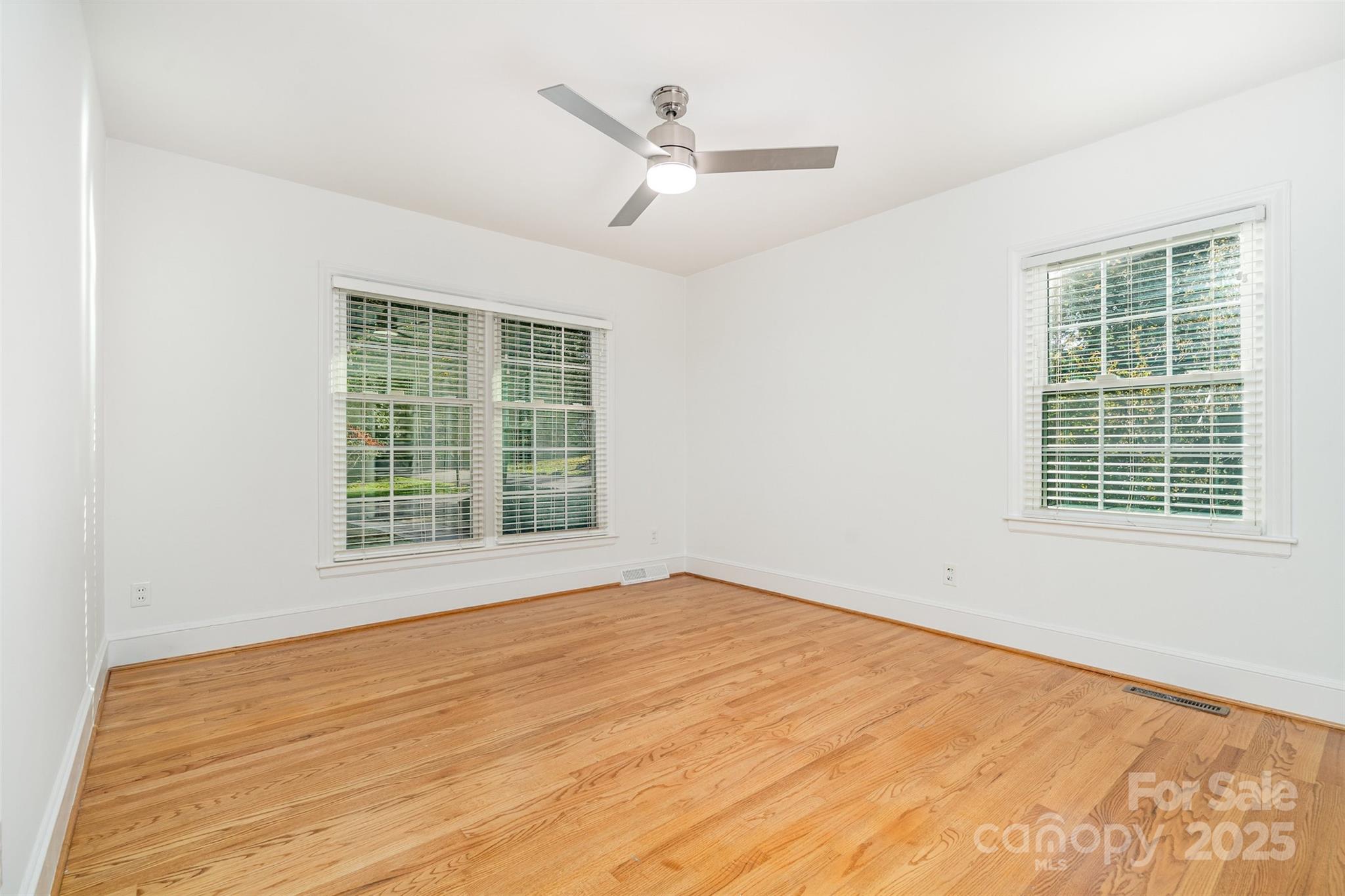 5411 Doncaster Drive Charlotte, NC 28211 - Photo 20 of 40 a view of an empty room with a window