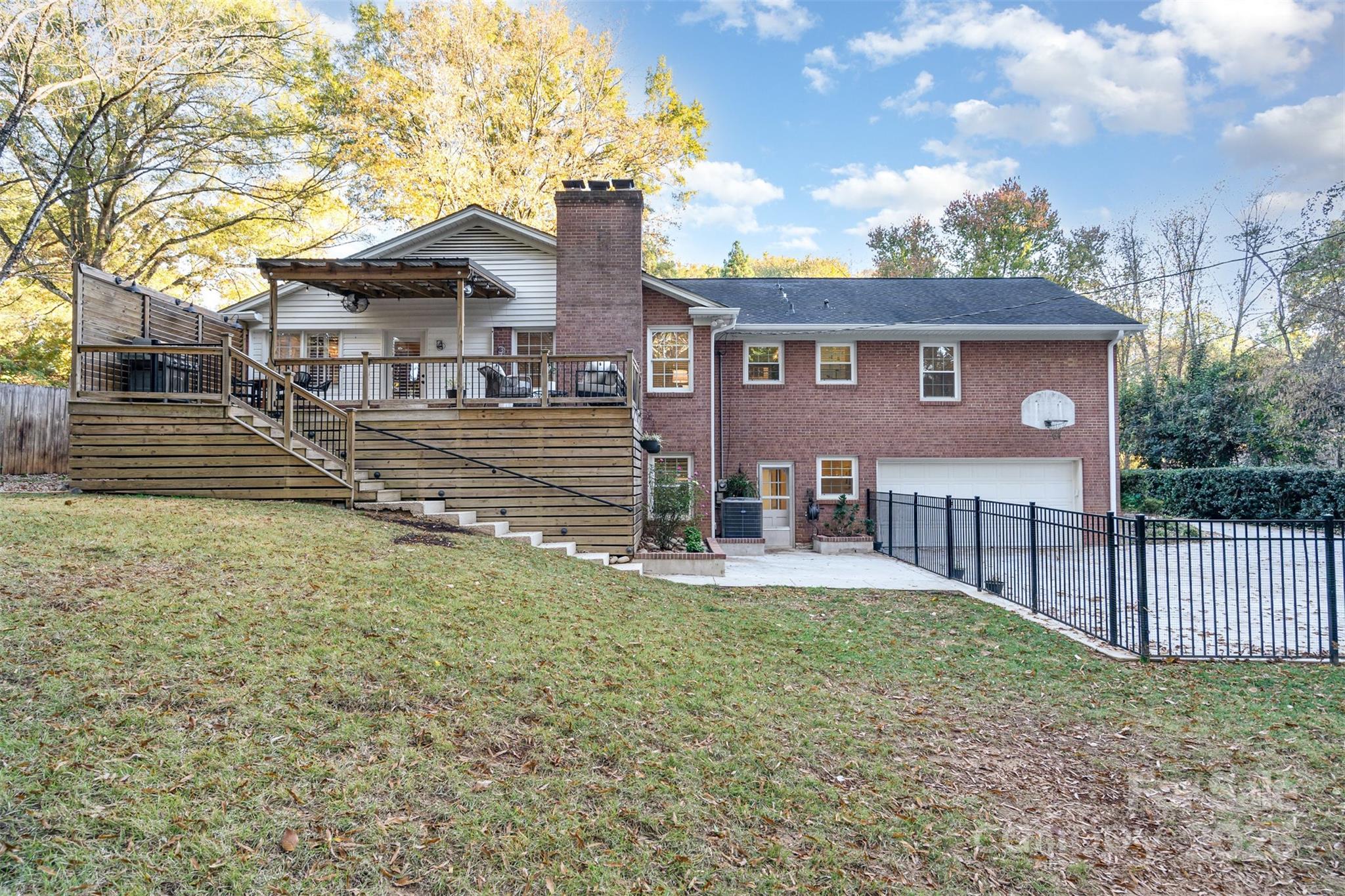 5411 Doncaster Drive Charlotte, NC 28211 - Photo 36 of 40 a view of a house with a yard