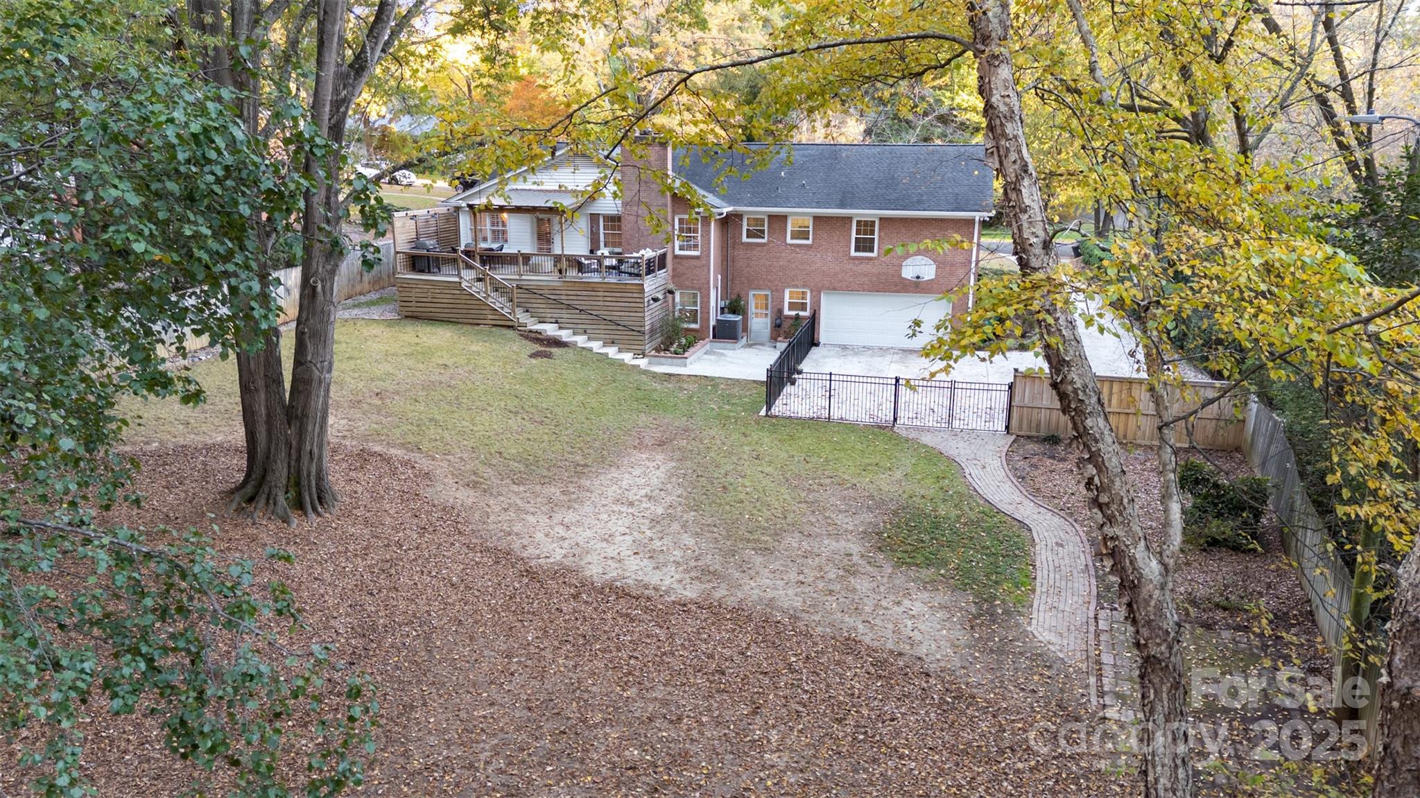 5411 Doncaster Drive Charlotte, NC 28211 - Photo 39 of 40 a view of a house with a yard
