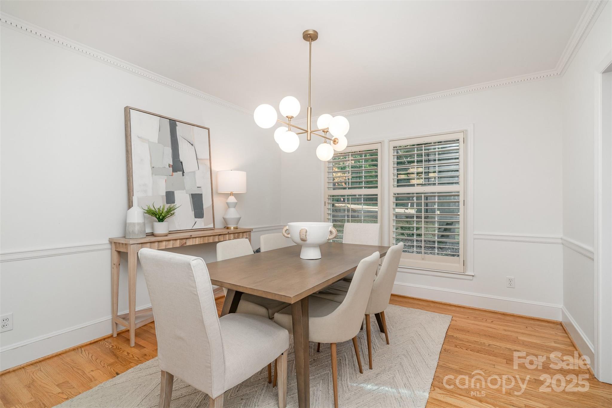 5411 Doncaster Drive Charlotte, NC 28211 - Photo 6 of 40 a view of a dining room with furniture and wooden floor