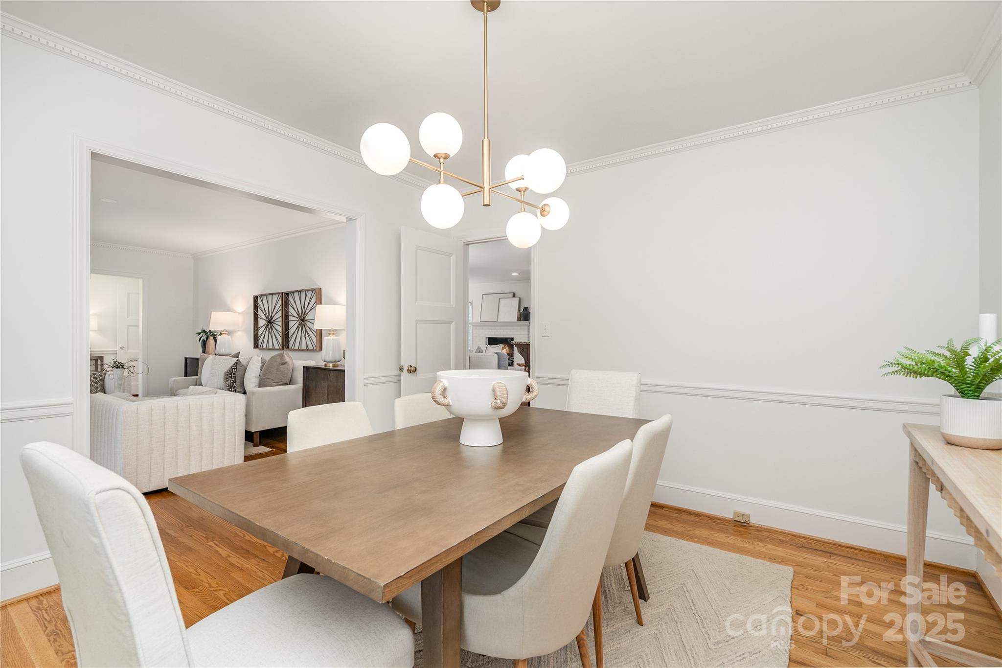 5411 Doncaster Drive Charlotte, NC 28211 - Photo 7 of 40 a view of a dining room with furniture and wooden floor