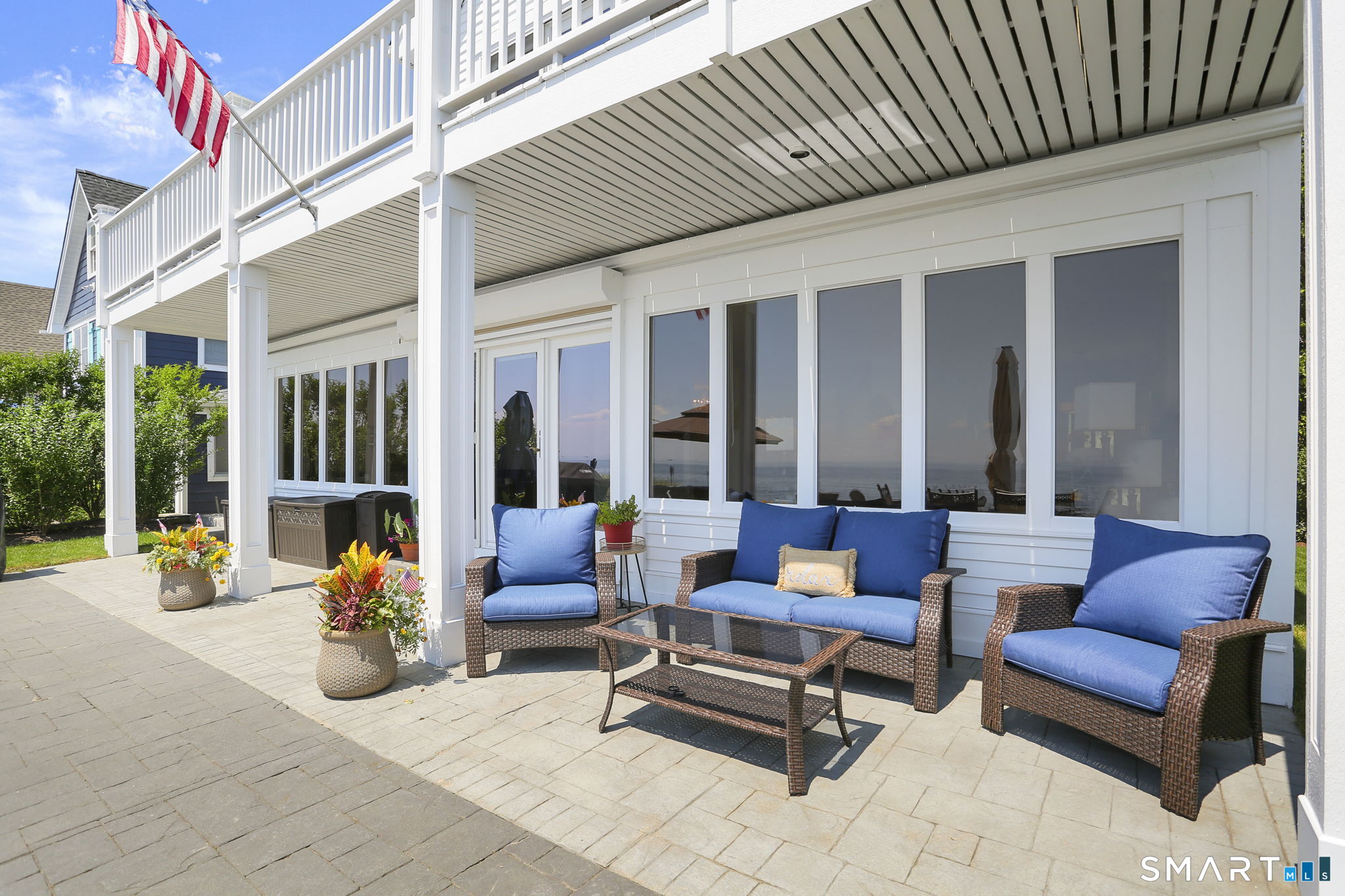 1149 Fairfield Beach Road Fairfield, CT 06824 - Photo 39 of 44 Patio offers some great covered space (shown here w/former patio)