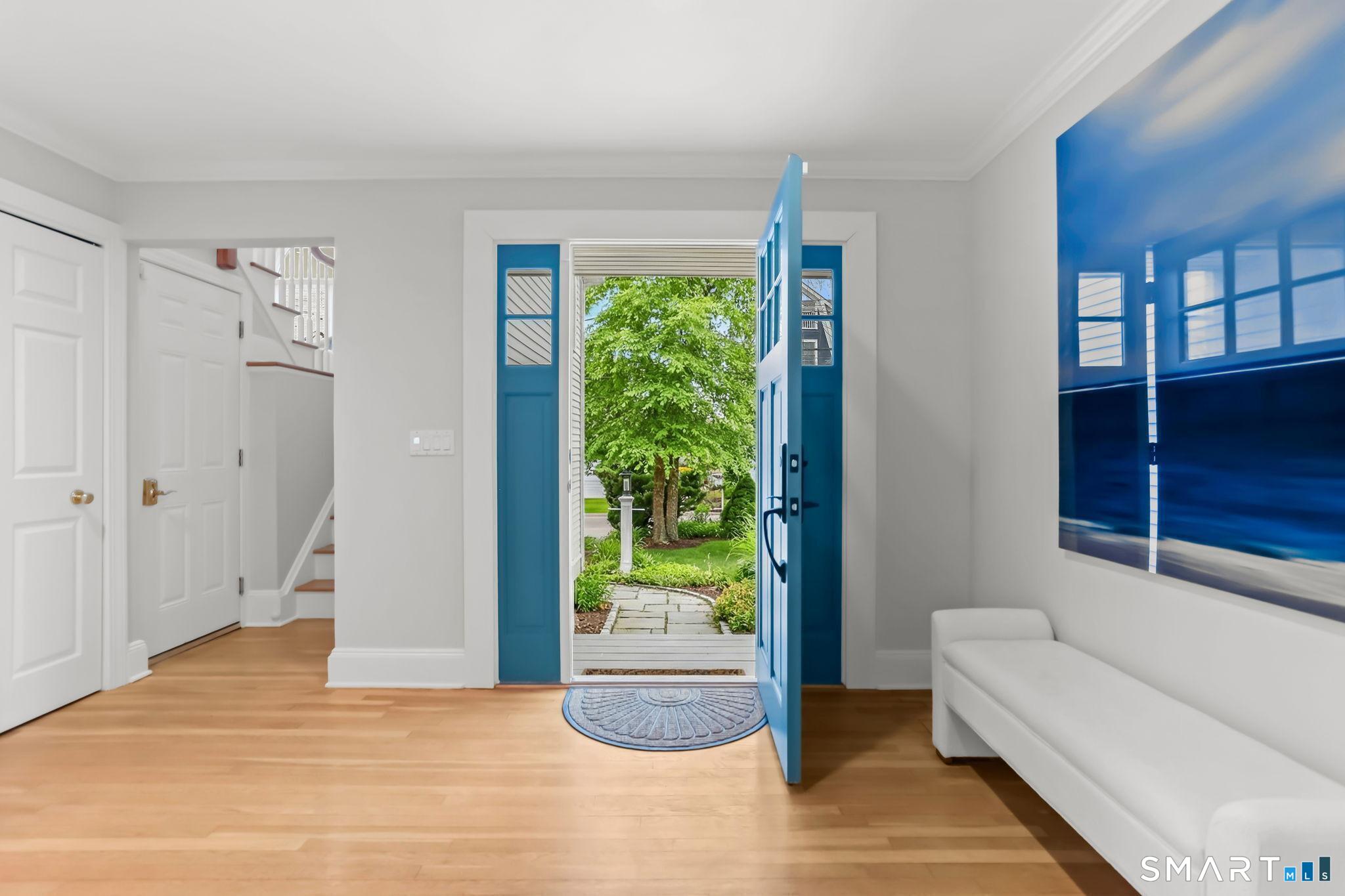1149 Fairfield Beach Road Fairfield, CT 06824 - Photo 8 of 44 Bright and spacious entry foyer offers lots of room for hellos and goodbyes. Mezzanine Great Room stairs and coat closet seen here to the left