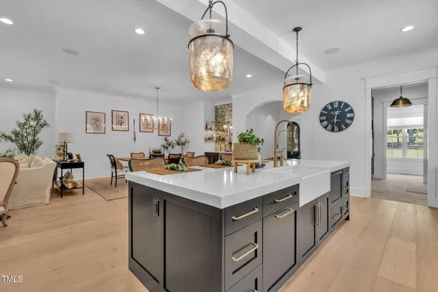 a kitchen with a stove and a sink