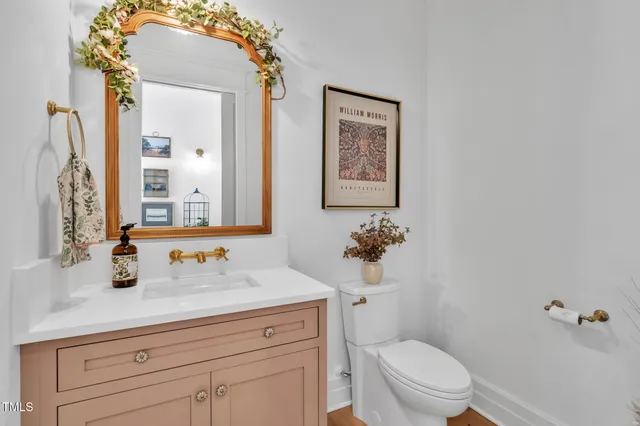 a view of a living room and bathroom