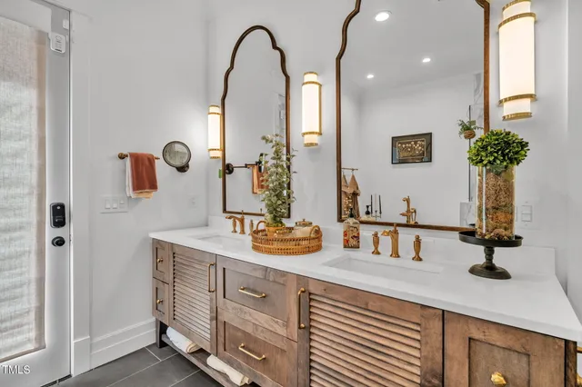 a bedroom with furniture and a wooden floor