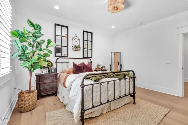 a bathroom with a toilet and a shower curtain