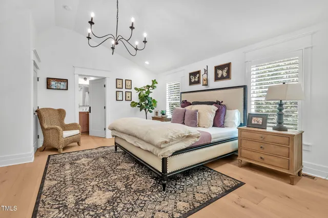 a bathroom with a toilet a sink and a mirror