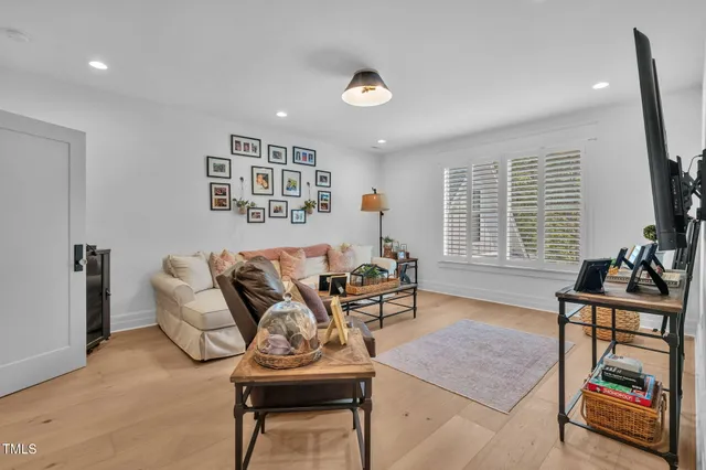 a kitchen with stainless steel appliances a sink a stove and cabinets