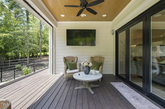 a front view of a house with a garden and entryway