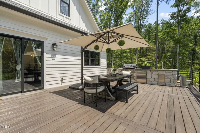 a view of a swimming pool with lounge chair
