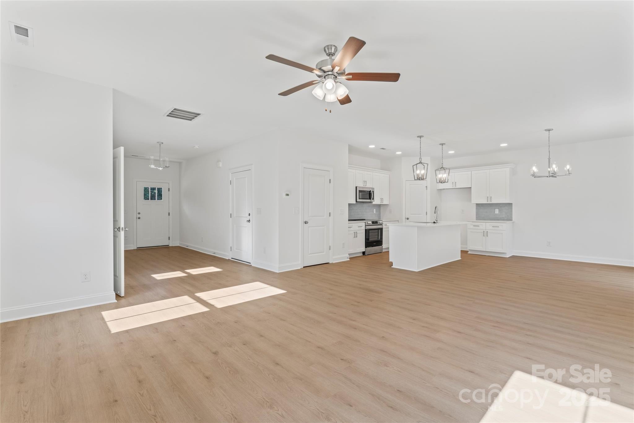 757 Mockingbird Road, Unit 4 Albemarle, NC 28001 - Photo 13 of 36 a view of an empty room with a kitchen