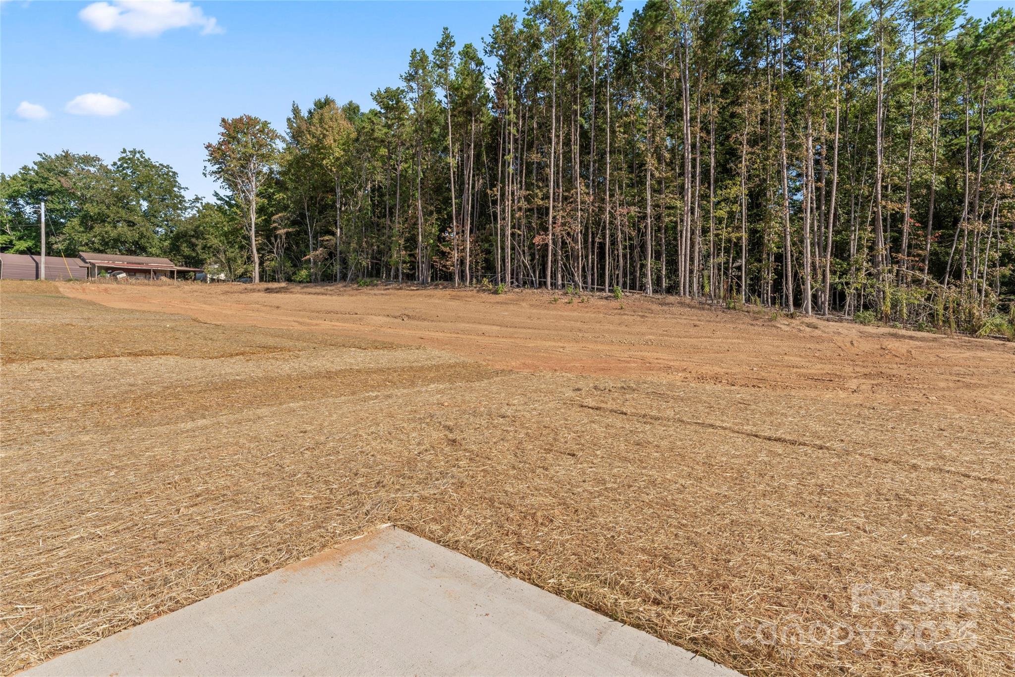 757 Mockingbird Road, Unit 4 Albemarle, NC 28001 - Photo 20 of 36 a view of outdoor space with trees