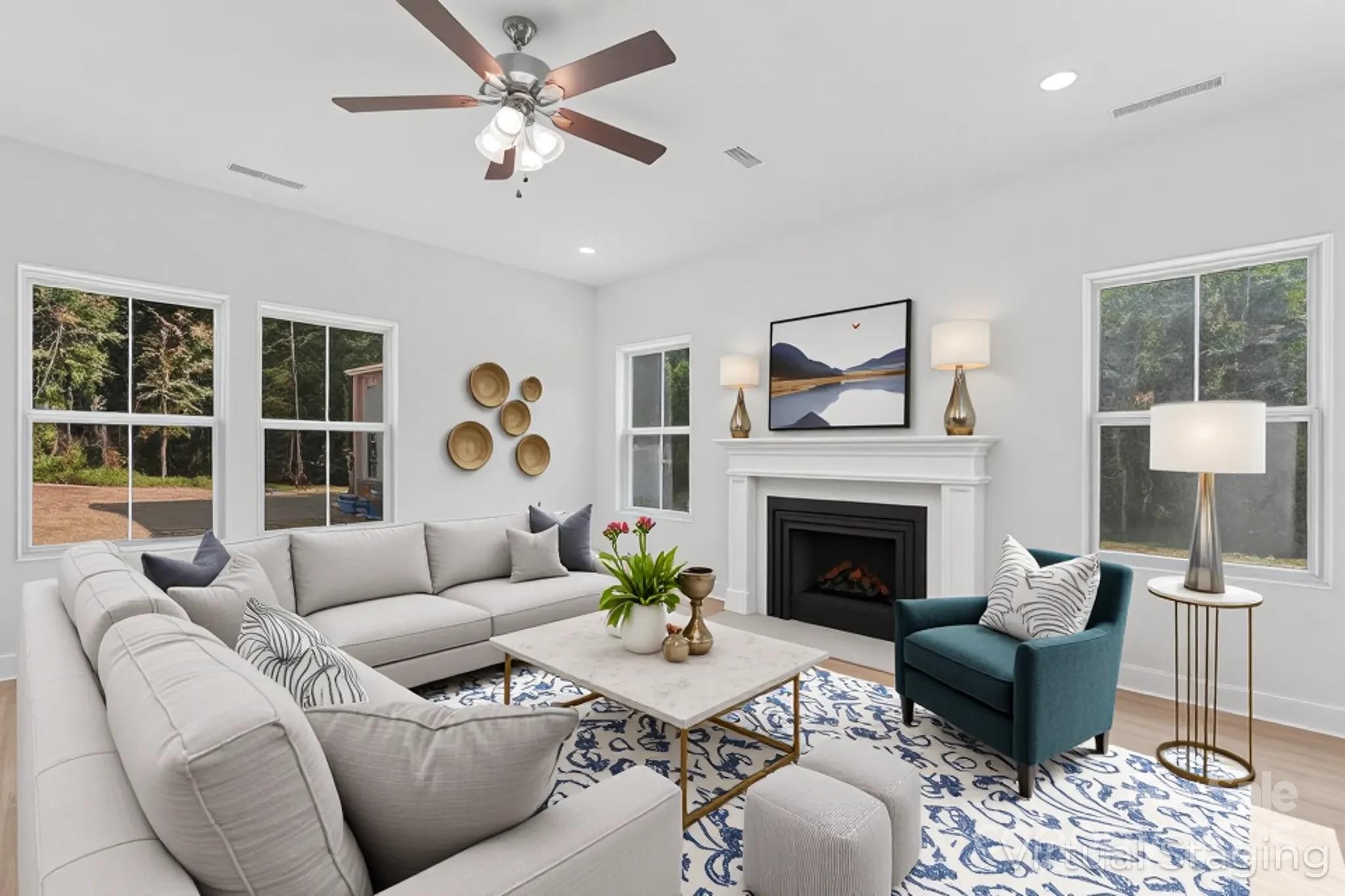 757 Mockingbird Road, Unit 4 Albemarle, NC 28001 - Photo 3 of 36 a living room with furniture a chandelier and a fireplace