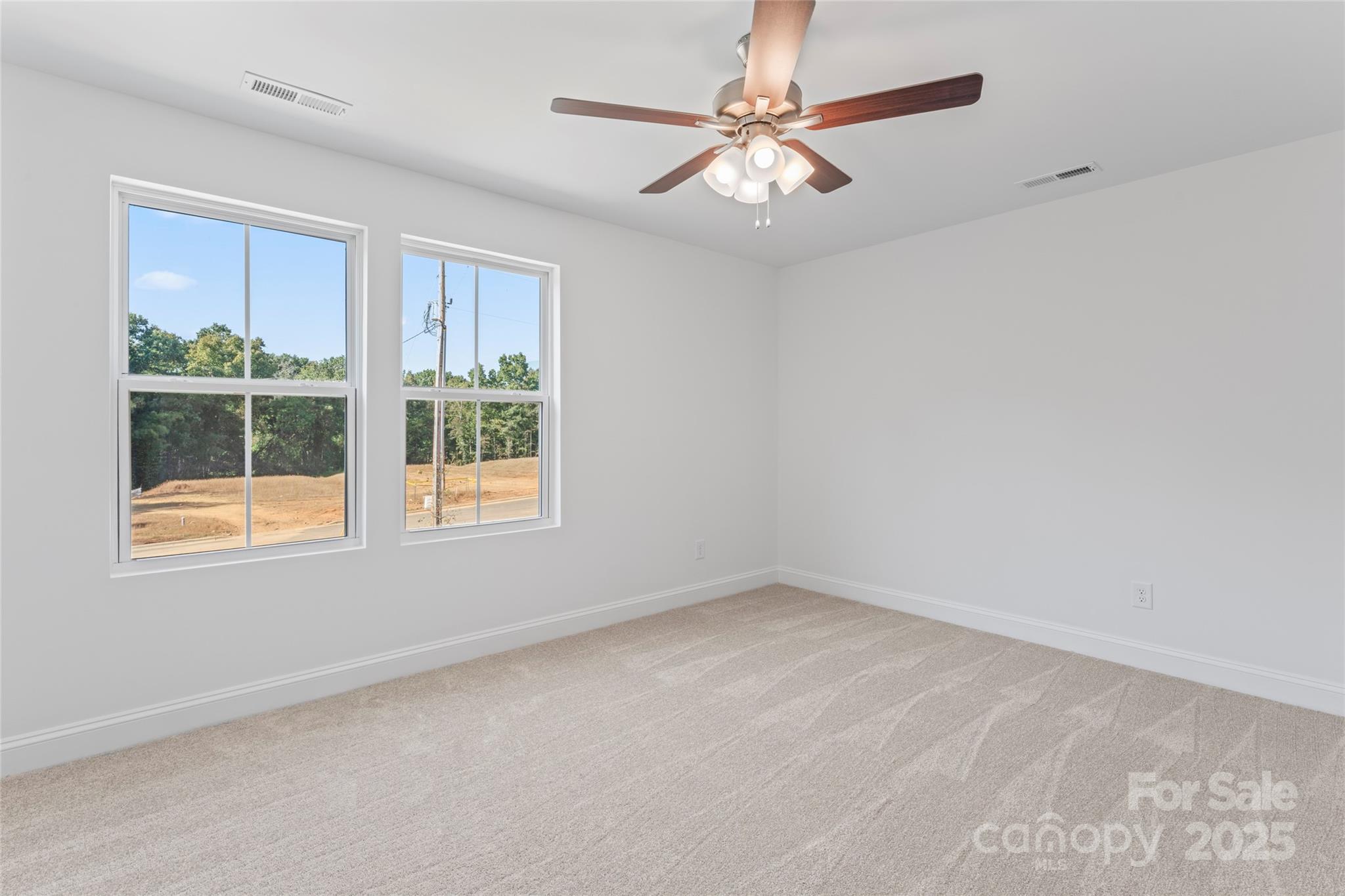 757 Mockingbird Road, Unit 4 Albemarle, NC 28001 - Photo 35 of 36 an empty room with a window