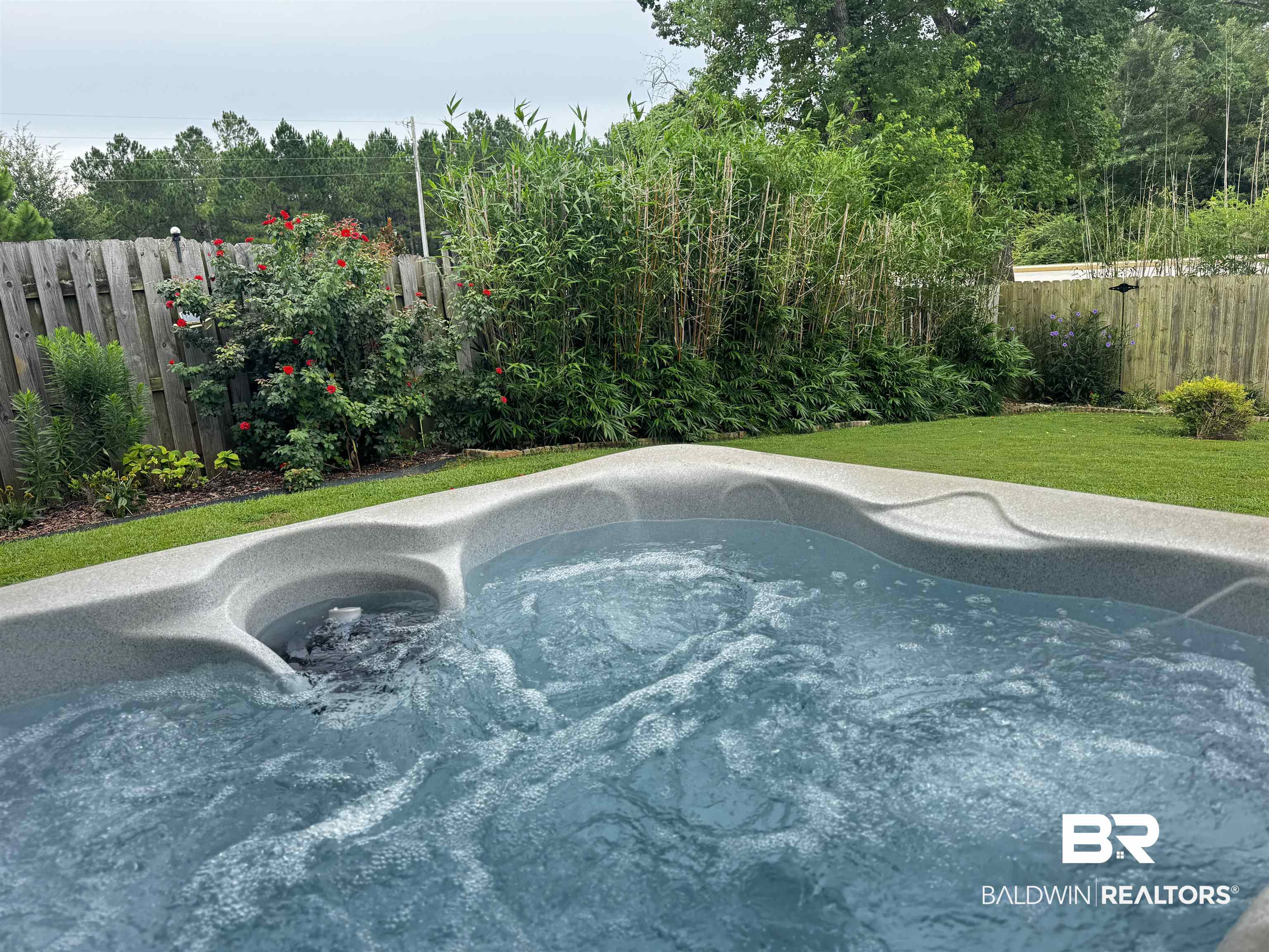 1030 Crown Walk Drive Foley, AL 36535 - Photo 32 of 40 View of swimming pool featuring a hot tub