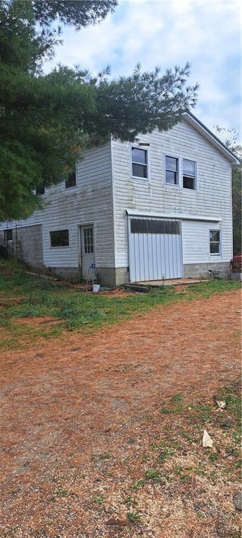 252 Rock Run Road Punxsutawney, PA 15767 - Photo 13 of 15 a view of a house with a yard