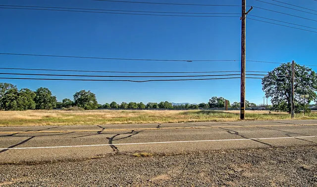 a view of a parking area with an ocean view