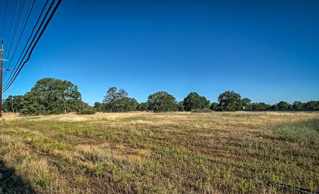a view of an ocean beach and mountain