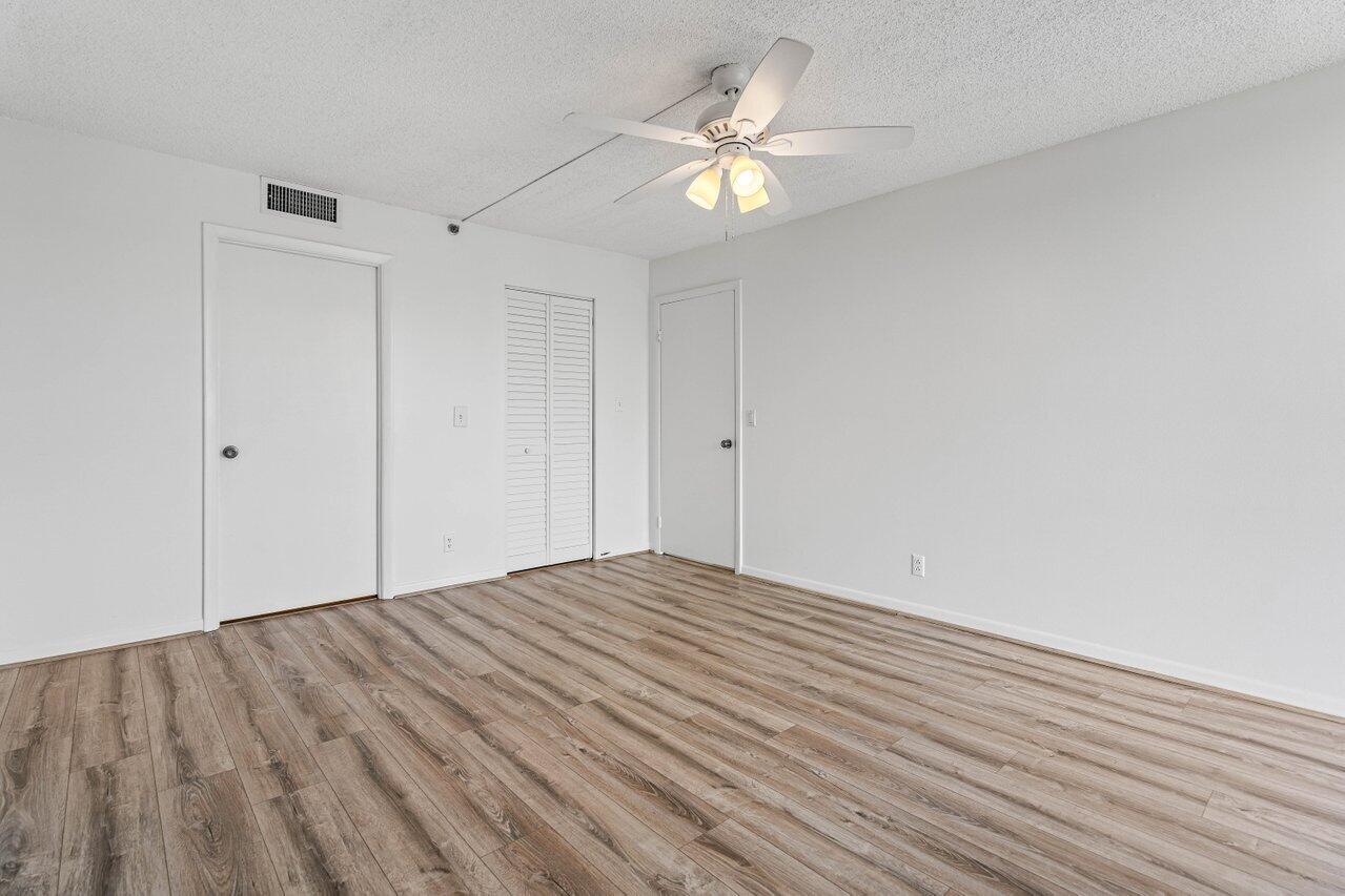198 Northwest 67th Street, Unit 403 Boca Raton, FL 33487 - Photo 24 of 32 Primary Bedroom
