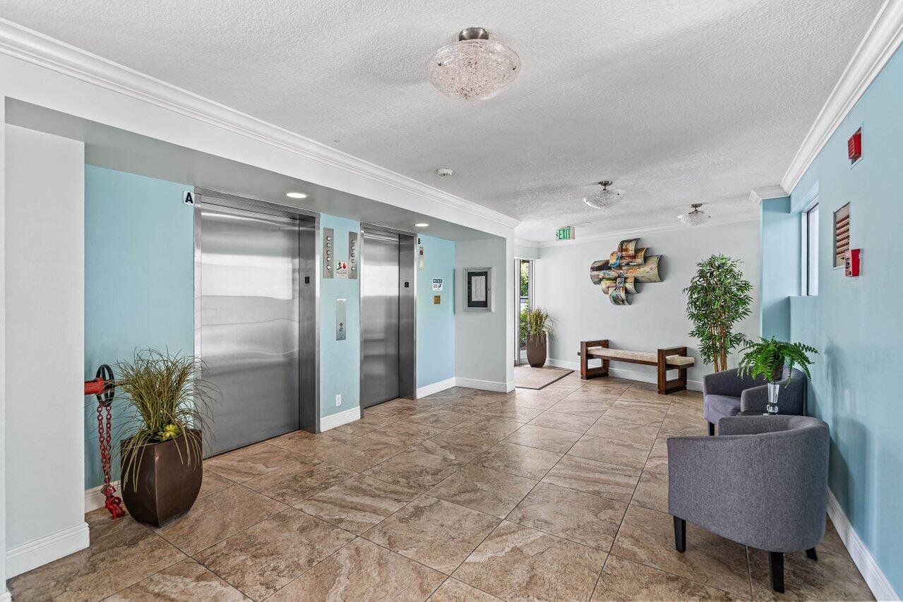 198 Northwest 67th Street, Unit 403 Boca Raton, FL 33487 - Photo 30 of 32 Lobby