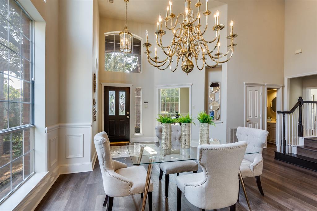 4015 Stonehollow Way Dallas, TX 75287 - Photo 1 of 26 a view of a dining room with furniture window and wooden floor