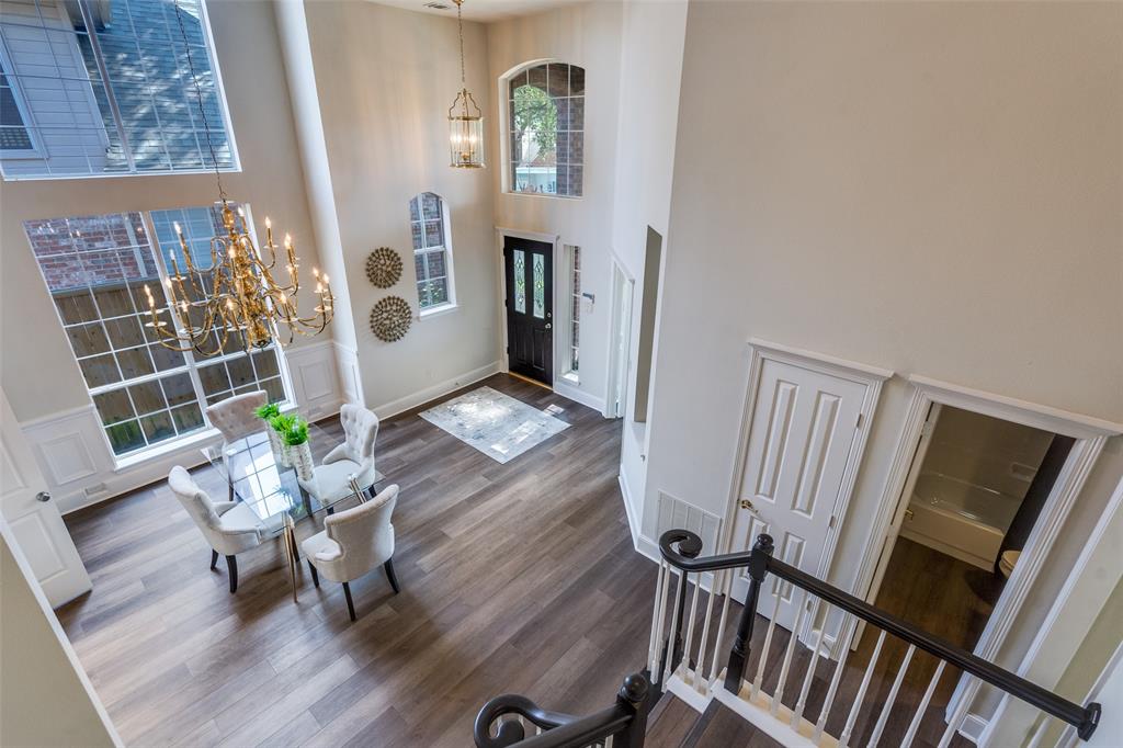 4015 Stonehollow Way Dallas, TX 75287 - Photo 19 of 26 a living room with furniture and a window