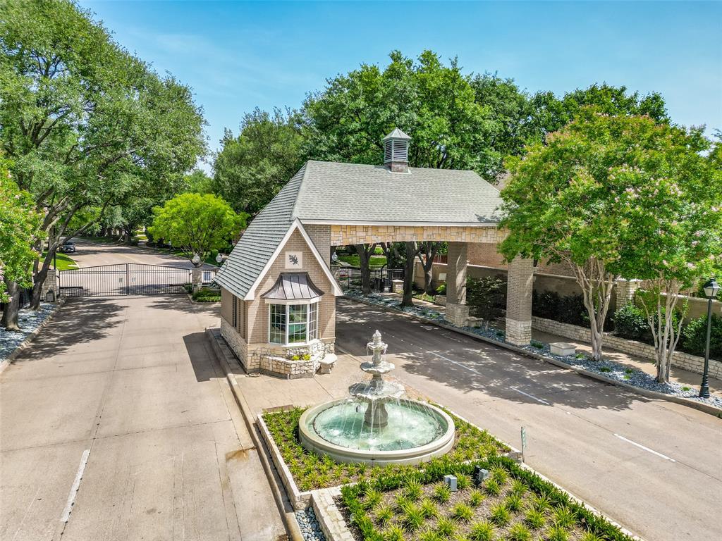 4015 Stonehollow Way Dallas, TX 75287 - Photo 2 of 26 a patio with a table and chairs and potted plants