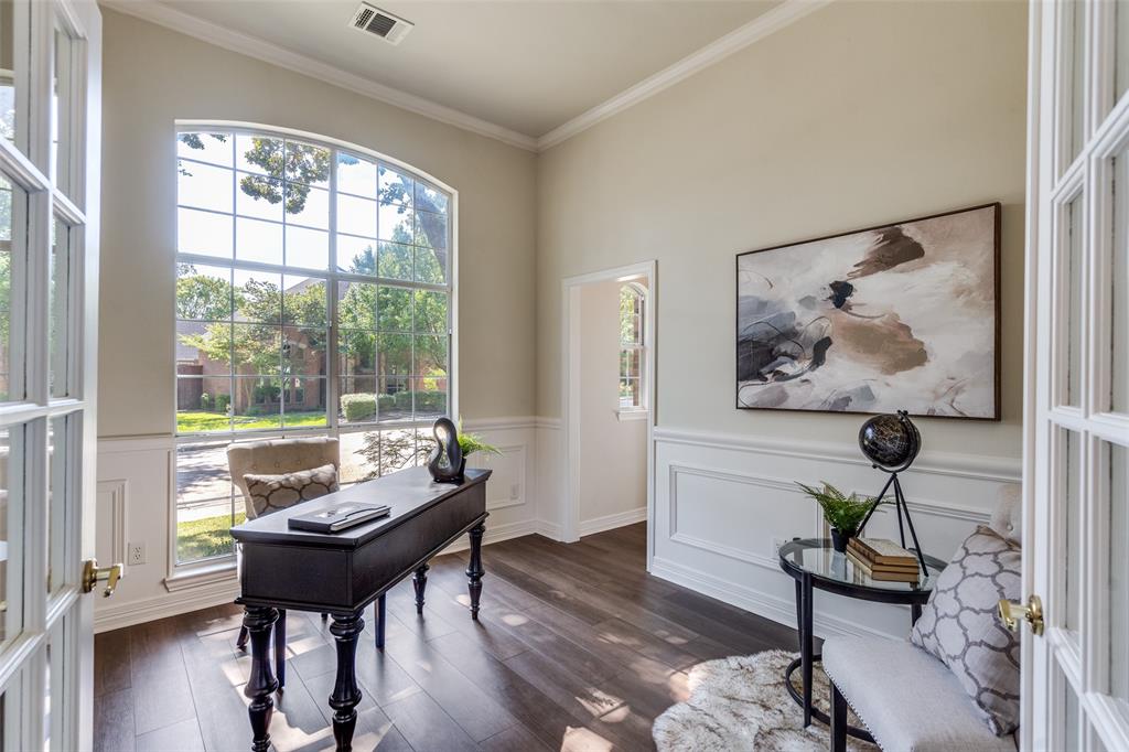 4015 Stonehollow Way Dallas, TX 75287 - Photo 5 of 26 a living room with furniture and a window