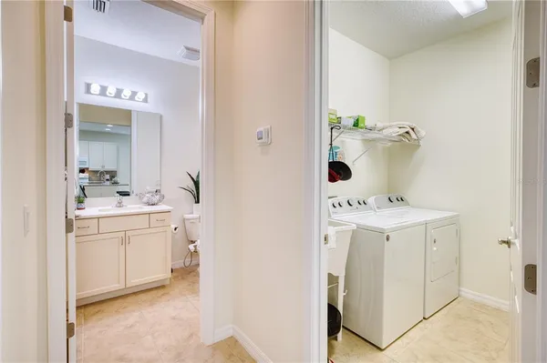a bathroom with a sink and mirror