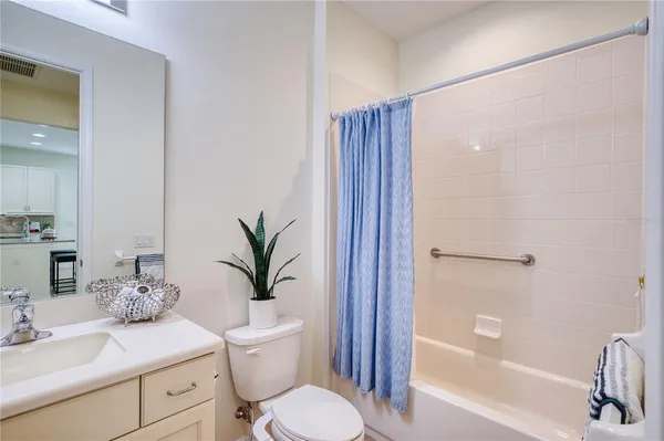 a bathroom with a toilet a sink and a bathtub