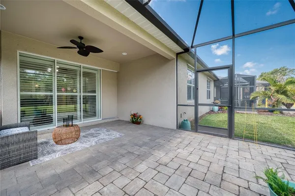 a view of a porch with seating space
