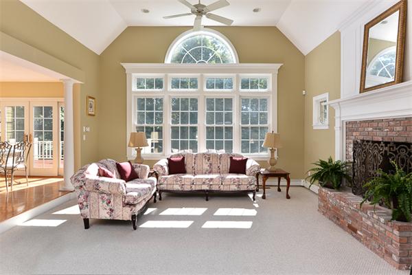 108 Deerfield Lane Hanover, MA 02339 - Photo 11 of 28 a living room with furniture and a large window