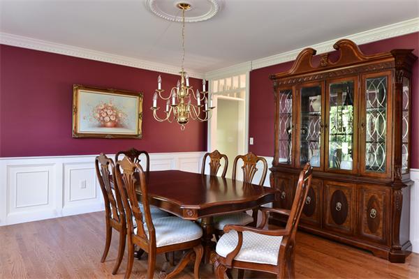 108 Deerfield Lane Hanover, MA 02339 - Photo 12 of 28 a view of a dining room with furniture window and wooden floor
