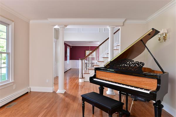 108 Deerfield Lane Hanover, MA 02339 - Photo 14 of 28 a view of entryway and hall with wooden floor