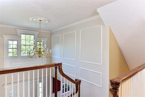 108 Deerfield Lane Hanover, MA 02339 - Photo 17 of 28 a view of a porch with wooden floor and stairs