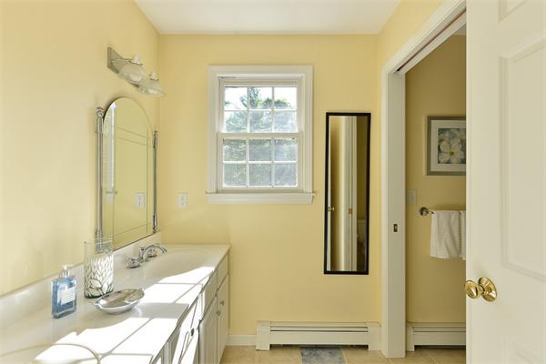 108 Deerfield Lane Hanover, MA 02339 - Photo 21 of 28 a bathroom with a granite countertop sink a mirror and a shower