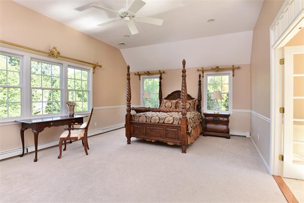 108 Deerfield Lane Hanover, MA 02339 - Photo 22 of 28 a bedroom with a bed and a large window