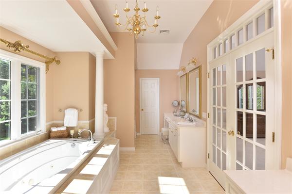 108 Deerfield Lane Hanover, MA 02339 - Photo 24 of 28 a living room with furniture windows and a chandelier