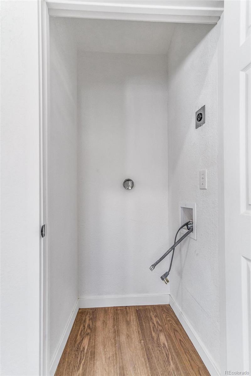 350 South Elbert Street Elizabeth, CO 80107 - Photo 15 of 22 a view of a room with wooden floor