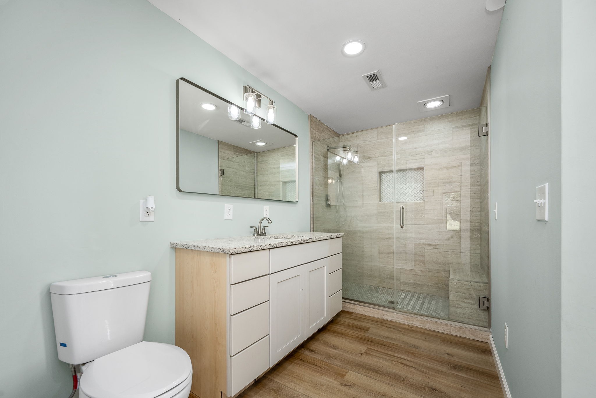 2180 Polly Adams Road Petersburg, TN 37144 - Photo 15 of 57 a bathroom with a toilet sink shower and mirror