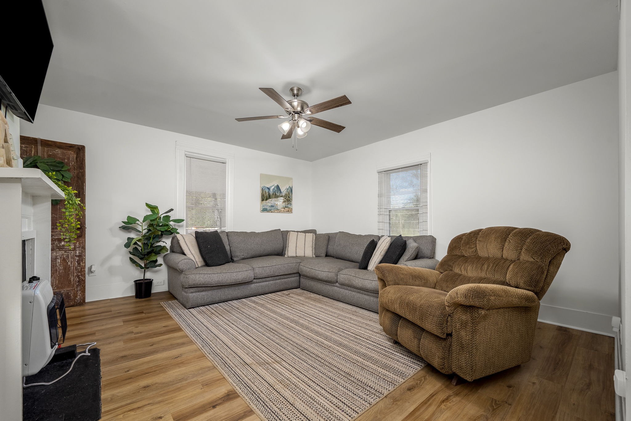 2180 Polly Adams Road Petersburg, TN 37144 - Photo 19 of 57 a living room with furniture and a fireplace